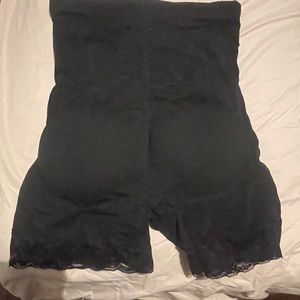 Brand new shape wear. Complete with padded tush.